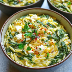 To make Creamy One-Pot Spinach Feta Orzo, gather these simple ingredients: - 1 cup orzo pasta - 4 cups vegetable broth - 2 cups fresh spinach - 1 cup feta cheese, crumbled - 1 small onion, finely chopped - 3 cloves garlic, minced - 1 tablespoon olive oil - 1 teaspoon dried oregano - 1/2 teaspoon red pepper flakes (optional for heat) - Salt and pepper to taste - Fresh parsley, chopped (for garnish) These ingredients blend well to create a creamy and flavorful dish. The orzo brings a nice texture, while the feta adds a rich taste. You can customize this dish easily. Consider adding: - Grilled chicken for protein - Sun-dried tomatoes for extra flavor - Artichoke hearts for a unique twist These additions can change the dish to suit your taste. Feel free to experiment and make it your own! To prepare this dish, you’ll need some basic tools: - A large pot or deep skillet - A wooden spoon for stirring - A sharp knife for chopping Having the right tools makes cooking easier. With these items, you're set to create a delightful meal! Gather all your ingredients first. This makes cooking smooth and easy. You will need: - 1 cup orzo pasta - 4 cups vegetable broth - 2 cups fresh spinach - 1 cup feta cheese, crumbled - 1 small onion, finely chopped - 3 cloves garlic, minced - 1 tablespoon olive oil - 1 teaspoon dried oregano - 1/2 teaspoon red pepper flakes (optional) - Salt and pepper to taste - Fresh parsley, chopped Chop the onion and mince the garlic. Crumble the feta cheese. Wash the spinach. This prep makes it easy to cook quickly. Start by heating the olive oil in a large pot or deep skillet over medium heat. Add the chopped onion and cook for 3-4 minutes until it turns soft and clear. This step builds flavor. Next, stir in the minced garlic. Cook it for about 1 minute, but do not let it burn. Now, add the orzo pasta. Toast it by stirring for 1-2 minutes until it gets a light golden color. This adds a nice nutty taste. Pour in the vegetable broth. Add the dried oregano and red pepper flakes if you want a little heat. Stir everything well. Bring the mix to a boil, then lower the heat to a simmer. Cover the pot and let it cook for about 10 minutes. Stir it every now and then. The orzo should be soft, and most of the broth should be soaked up. Once done, take the pot off the heat. Stir in the fresh spinach and crumbled feta cheese. The heat will wilt the spinach and melt the cheese, creating a creamy texture. Now, taste your dish. Add salt and pepper as needed. For serving, I love to use deep bowls. This way, it looks great. Drizzle a bit of olive oil on top for extra flavor and a shine. Garnish with fresh parsley for a pop of color. Enjoy your creamy one-pot spinach feta orzo! To get orzo just right, watch the cooking time closely. Cook it until it is al dente, which means it should still have a slight bite. Stir occasionally to stop it from sticking. If you want a creamier dish, add a splash of vegetable broth or water at the end. This helps create a smooth, rich texture. Add depth to your orzo by using fresh herbs. Basil, thyme, or even dill can brighten the dish. For a kick, include more red pepper flakes. If you love garlic, don't hold back. Adding more minced garlic boosts the flavor. A squeeze of fresh lemon juice at the end adds a nice zing too. Use pre-chopped onions and garlic to save time. You can also buy pre-washed spinach to cut down on prep. Cook the orzo in the same pot as the other ingredients to save on dishes. This one-pot method makes cleanup easy and quick. Make sure to have all your ingredients ready before you start cooking. This way, you can keep things moving smoothly. {{image_2}} You can easily add meat to this dish. Cooked chicken or shrimp works well. Just toss it in after you add the spinach and feta. This adds protein and makes the meal heartier. If you prefer beef, ground meat is a great choice too. Brown it first with the onion for extra flavor. You can also use sausage for a tasty twist. If you want a vegetarian version, skip the meat and use vegetable broth. Replace feta cheese with tofu or a vegan cheese. This keeps it creamy while making it plant-based. For a nutty flavor, add nutritional yeast. It gives a cheesy taste without dairy. You can also mix in other greens like kale or Swiss chard for added nutrients. Feel free to swap in seasonal veggies. In spring, add peas or asparagus for freshness. In summer, zucchini or bell peppers bring color and taste. Fall brings squash or pumpkin for a cozy feel. In winter, root vegetables like carrots or sweet potatoes work well. Just adjust cooking time based on the veggies you choose to keep them tender. To store leftover Creamy One-Pot Spinach Feta Orzo, let it cool first. Transfer it to an airtight container. This helps keep it fresh. You can store it in the fridge for up to three days. If you plan to keep it longer, freezing is a better option. When reheating, use a pot on low heat. Add a splash of vegetable broth for moisture. Stir it often to avoid sticking. This keeps the orzo creamy and tasty. You can also microwave it in short bursts. Check and stir between intervals to heat evenly. For freezing, place the orzo in a freezer-safe container. Leave some space for expansion. It can last up to three months in the freezer. To eat, thaw it overnight in the fridge. Reheat as mentioned above for the best flavor and texture. Orzo takes about 10 minutes to cook. When you add it to the pot, keep an eye on it. Stir occasionally to prevent sticking. You want it to be al dente, which means it should still have a slight bite. Yes, you can use different cheese. If you don't have feta, try goat cheese or ricotta. Each cheese will bring a different flavor. Just remember to use a cheese that melts well for a creamy texture. You can serve orzo with a fresh salad or grilled chicken. It also pairs well with roasted vegetables. For a lighter meal, try adding a side of steamed broccoli or a simple tomato salad. Enjoy mixing and matching! This guide covers ingredients, cooking steps, and tips for perfect orzo. You learned how to customize it with different ingredients and tools. We touched on making it vegetarian or adding meat. I shared storage tips and answered common questions. With this information, you can make orzo your own. Now, it’s time to gather your ingredients and start cooking!