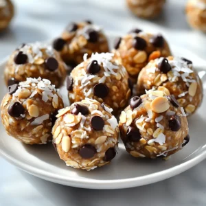- 1 cup rolled oats - 1/2 cup almond butter - 1/4 cup honey or maple syrup - 1/4 cup unsweetened shredded coconut - 1/4 cup dark chocolate chips - 1/4 cup sliced almonds - 1/2 teaspoon vanilla extract - Pinch of salt When you gather your ingredients, freshness matters. Rolled oats give a hearty base. Almond butter adds creaminess. Honey or maple syrup brings sweetness. Shredded coconut gives a tropical touch. Dark chocolate chips add a rich depth. Sliced almonds provide a nice crunch. Vanilla extract enhances flavor, while salt balances everything. - Alternatives for almond butter: You can use peanut butter or sunflower seed butter. Both work well and offer a different taste. - Sugar-free options for honey or maple syrup: Consider using agave syrup or stevia. These options keep your energy balls sweet without added sugars. - Different types of chocolate or nuts: Swap dark chocolate for milk chocolate or even white chocolate. You can use cashews or walnuts instead of almonds for a twist. Feel free to mix and match these ingredients. The goal is to create a tasty snack that fits your style. Explore different flavors and textures to find your favorite combination. To start, grab a large mixing bowl. This is where all the magic happens. - Combine these ingredients: - 1 cup rolled oats - 1/2 cup almond butter - 1/4 cup honey or maple syrup - 1/4 cup unsweetened shredded coconut - 1/4 cup dark chocolate chips - 1/4 cup sliced almonds - 1/2 teaspoon vanilla extract - Pinch of salt Mix them well. You want everything to stick together. If the mixture feels too dry, just add a little more almond butter. Now comes the fun part! Use your hands to form the mixture into small balls. Aim for about one inch in diameter. Place the energy balls on a baking sheet lined with parchment paper. Once you’ve rolled them all, put the baking sheet in the fridge. Let them chill for about 30 minutes. This will help them firm up nicely. When the time is up, take the energy balls from the fridge. Store them in an airtight container. - For the best freshness, use a container that seals well. - You can keep them in the fridge for up to one week. - If you want to save them longer, freeze them. They will last well in the freezer. Enjoy your tasty and healthy snack! To get the right texture, aim for a sticky mix. If it feels too crumbly, add more almond butter. This helps bind everything together, making the balls easy to form. Mix well using a spatula or your hands. I find hands give the best control. To impress your guests, serve the energy balls on a bright platter. Sprinkle a bit of shredded coconut on top for flair. You can also label them for fun. These snacks pair well with smoothies or tea. Get your kids involved in making these treats. Let them scoop and roll the mixture into balls. This makes cooking fun and teaches them useful skills. You can add toppings like mini chocolate chips or sprinkles for extra fun. These little touches make the energy balls even more delightful! {{image_2}} You can change the flavor of your energy balls easily. Adding spices like cinnamon or nutmeg gives a warm taste. Just sprinkle in about a half teaspoon of your chosen spice. You can also mix in dried fruits, like raisins or cranberries. This adds natural sweetness and chewiness to each bite. If you need a nut-free option, swap almond butter for sunflower seed butter. This keeps the texture creamy while avoiding nuts. You can also choose mix-ins like pumpkin seeds or crispy rice cereal. These alternatives give a nice crunch and keep the recipe safe for everyone. You can make energy balls in different sizes. For mini bites, roll them smaller than one inch. If you want larger balls, just make them about two inches wide. You can also shape them into bars or bites. This adds variety and makes them fun to eat. Try using a baking dish for bars, pressing the mixture down for a neat shape. To keep your energy balls fresh, use an airtight container. Glass or plastic containers work well. Make sure to label them with the date you made them. This helps you track their freshness. Store them in the fridge for easy access. These energy balls last up to one week in the fridge. For longer storage, freeze them. Place them in a single layer on a baking sheet. Once frozen, transfer them to a freezer bag. This keeps them from sticking together. To thaw, leave them in the fridge overnight. They will be ready to eat in the morning. Check for any change in smell or color. If they smell sour or look odd, toss them out. Old energy balls may also have a dry texture. If you notice these signs, it’s best to discard them. Always trust your senses to ensure quality. Yes, you can. If you need a nut-free option, use sunflower seed butter. For a different flavor, try peanut butter or cashew butter. Just know that the taste will change slightly. These energy balls last up to one week in the fridge. You can also freeze them for up to three months. Just make sure to store them in an airtight container. Each energy ball has about 100 calories. They provide 4 grams of protein and 5 grams of healthy fats. The fiber content is around 2 grams. This makes them a great snack choice. Absolutely! Adding protein powder boosts the nutrient content. Start with one scoop and mix well. You may need to add a little more almond butter for moisture. Yes, these energy balls are safe for kids. They are made with healthy ingredients. Just watch for any nut allergies. They make a great snack for school or playtime. You now have a solid guide to making tasty energy balls. We covered ingredients, steps, and storage tips. You learned how to customize flavors and make healthy choices. Remember, these snacks are easy to prepare and fun to share. Try them at your next gathering or for snack time. With a few swaps and tweaks, you can fit them into any diet. Enjoy your cooking and happy snacking!
