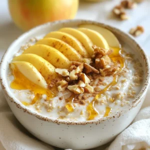 - 1 cup rolled oats - 1 cup almond milk (or any milk of choice) - 1 medium apple, grated - 1 teaspoon cinnamon - 2 tablespoons honey or maple syrup - Pinch of salt - 1 tablespoon chia seeds - 1/4 cup Greek yogurt (optional for creaminess) - Chopped nuts (walnuts or pecans) for topping - Sliced apple for garnish Each ingredient plays a key role in making your apple cinnamon overnight oats tasty and satisfying. The rolled oats serve as the base, soaking up flavors. Almond milk brings creaminess and a touch of sweetness. The grated apple adds natural sweetness and a fun texture. Cinnamon boosts warmth and aroma. Honey or maple syrup sweetens the dish, while a pinch of salt balances the flavors. If you want to add more nutrition, consider chia seeds. They add fiber and omega-3s. Greek yogurt makes your oats creamier and richer. Topping your oats with chopped nuts adds crunch. Sliced apple gives a fresh touch that looks great too. Feel free to mix and match these ingredients based on what you have. Personalizing your overnight oats makes each bowl a unique delight. {{ingredient_image_1}} 1. In a medium bowl, combine the rolled oats, almond milk, grated apple, chia seeds, honey or maple syrup, cinnamon, and a pinch of salt. 2. If you want creamier oats, stir in the Greek yogurt now. Mix well until everything is blended. 1. Transfer the mixture into individual jars or containers with lids. This makes it easy to grab when you’re in a hurry. 2. Cover the jars tightly and place them in the fridge overnight. Letting them soak helps the oats become soft. 1. When you're ready to eat, give the oats a good stir. If it seems too thick, add a splash of milk to loosen it up. 2. Top your oats with chopped nuts and sliced apple. If you like it sweeter, drizzle a bit more honey or syrup on top. To make your oatmeal just right, you can adjust the thickness. If you like thicker oats, use less milk. If you prefer them thin, add a little more milk. Stir well after adding milk to blend it nicely. Blending flavors is key for great taste. Mix oats and milk first. Then, add the grated apple and cinnamon. This way, the apple and spice spread evenly throughout the oats. Want to save time in the morning? Make these oats the night before. It only takes 10 minutes to prepare. You can even make a few jars at once. This is perfect for busy days. When storing, use jars with tight lids. This keeps them fresh. You can store them in the fridge for up to five days. Just remember to stir before eating. Finding the right sweetness can make a big difference. If you want it sweeter, add more honey or maple syrup. You can also taste as you mix to find your perfect level. If you're looking for alternatives, try agave syrup or stevia. These options can give you the sweetness you want without extra calories. Pro Tips Use Fresh Apples: For the best flavor and texture, use fresh, crisp apples. Varieties like Honeycrisp or Fuji work wonderfully. Adjust Sweetness to Taste: Depending on your apple's sweetness, you may want to adjust the amount of honey or maple syrup for your preference. Try Different Milk Alternatives: Experiment with various milk alternatives like oat milk or coconut milk to find your favorite combination. Make It Ahead: These overnight oats can be prepared up to 3 days in advance, making them a great meal prep option for busy mornings. {{image_2}} You can switch up the fruit in your oats. Try bananas, berries, or peaches. Each fruit has its own taste and can change the dish. You can also add nut butters like almond or peanut. They add creaminess and flavor. Spices like nutmeg or ginger work well too. Experiment with what you like best! If you want a vegan option, skip the Greek yogurt. Use plant-based milk instead of dairy. You can also leave out honey and use maple syrup or agave. For those needing gluten-free meals, choose certified gluten-free oats. This keeps your dish safe and tasty! Pair your oats with yogurt for extra creaminess. You can also serve them with fruit cocktails for a fresh touch. Another fun idea is to blend your oats into a smoothie bowl. Just add more milk and blend until smooth. Top with fruits and nuts for a beautiful breakfast! To keep your Apple Cinnamon Overnight Oats fresh, store them in the fridge. They last about 3 to 5 days. Use airtight containers to avoid spills and odors. Check for any changes in smell or color. If they smell sour or look off, throw them away. You can freeze overnight oats if you want to save them for later. Use freezer-safe jars or bags. Leave some space at the top, as oats expand when frozen. To thaw, move them to the fridge overnight. You can also microwave them for a few minutes until soft. You can enjoy your oats cold or warm. If you prefer them warm, microwave them for about 30 seconds. Stir and check the temperature. Add a splash of milk to help heat evenly. If you like them cold, just stir and add your toppings. Enjoy your meal your way! Overnight oats stay fresh for about 4 to 5 days in the fridge. This is perfect for meal prep! To keep them fresh, store them in airtight containers. Make sure to check for any signs of spoilage before eating. Yes, you can make overnight oats without yogurt. If you skip it, your oats will still be tasty. For creaminess, you can add a bit more milk or use nut butter. This keeps the texture smooth and enjoyable. You can use many types of milk for overnight oats. Almond milk is a great choice, but you can also try oat milk, soy milk, or coconut milk. Each type will change the flavor a little. Just choose what you like best! In this post, I shared how to make easy and tasty overnight oats. You learned about the main ingredients, tips for great texture, and ways to customize your oats. Remember, these oats are perfect for busy mornings or a healthy snack. By trying different flavors and add-ins, you can make this simple dish your own. So grab your oats, milk, and favorite toppings to enjoy a delicious meal any time!