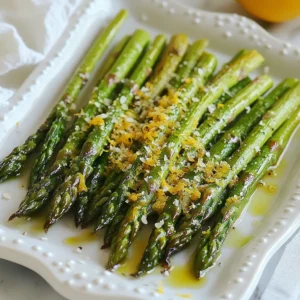 - 1 lb fresh asparagus, trimmed Fresh asparagus is the star of this dish. Look for bright green stalks that are firm and straight. The tips should be tightly closed. Trim off the woody ends before cooking. This helps ensure a tender bite. - 3 tablespoons olive oil - 4 cloves garlic, minced - Zest of 1 lemon - Juice of 1 lemon - 1 teaspoon sea salt - ½ teaspoon black pepper - ½ teaspoon red pepper flakes (optional) The seasoning brings out the best in asparagus. Olive oil adds richness. Garlic gives a bold flavor. The lemon zest and juice add brightness. Sea salt and black pepper enhance the taste. Red pepper flakes add a kick, but they are optional. - Grated Parmesan cheese (for serving, optional) Parmesan cheese adds a nice touch. It gives a savory flavor to the roasted asparagus. You can sprinkle it on right before serving for a creamy finish. {{ingredient_image_1}} First, you must preheat the oven to 425°F (220°C). This step ensures the asparagus roasts evenly. While it heats, grab a large bowl. In this bowl, mix 3 tablespoons of olive oil, 4 minced garlic cloves, the zest and juice of 1 lemon, 1 teaspoon of sea salt, ½ teaspoon of black pepper, and optional red pepper flakes. Stir it well to blend the flavors. Now, take your 1 pound of fresh asparagus and trim the ends. Once trimmed, add them to your bowl with the lemon-garlic mix. Toss the asparagus gently until every piece is coated with the mixture. This coating adds flavor and helps them roast beautifully. Next, spread the coated asparagus on a baking sheet lined with parchment paper. Ensure they are in a single layer. This helps them roast evenly. Place the baking sheet in your preheated oven. Roast the asparagus for 12 to 15 minutes. You should stir them halfway through to get a nice, even crisp. When they are tender and slightly crispy, they are ready! Once done, take them out and let them cool for a minute. If you want, sprinkle some grated Parmesan cheese on top before serving for an extra treat. When choosing asparagus, look for firm, bright green stalks. They should be smooth and straight, not limp or wrinkled. The tips should be closed and compact. If you see any flowers, avoid those. Choose thin to medium stalks for the best flavor and tenderness. To roast asparagus perfectly, preheat your oven to 425°F (220°C). This high heat helps the asparagus get crispy. Make sure to coat the asparagus well in the lemon-garlic mixture. Spread them out in a single layer on the baking sheet. This way, they will cook evenly. Stir halfway through to avoid burning. You can add different flavors to your asparagus. For a spicy kick, include red pepper flakes. If you love cheese, try adding grated Parmesan after roasting. You can also mix in herbs like thyme or rosemary for a fresh taste. A dash of balsamic vinegar adds a lovely depth. Experiment and find what you love! Pro Tips Choose Fresh Asparagus: Look for bright green, firm asparagus stalks with tightly closed tips for the best flavor and texture. Roasting Technique: Ensure the asparagus is in a single layer on the baking sheet to achieve even roasting and a crispy texture. Customize Seasoning: Feel free to adjust the amount of garlic, lemon, or red pepper flakes to suit your personal taste preferences. Serving Suggestions: Pair the asparagus with grilled chicken or fish for a complete meal, or serve it as a vibrant side dish at gatherings. {{image_2}} You can add protein to make this dish heartier. Chicken pairs well with lemon and garlic. Try thinly sliced chicken breasts. Simply add the chicken to the bowl with the asparagus. Toss it in the same lemon-garlic mix. You can also use shrimp for a seafood twist. They cook quickly and add a nice flavor. If you want a veggie boost, add cherry tomatoes or bell peppers. These add color and sweetness. Just toss them in with the asparagus. You can also sprinkle in some fresh herbs. Basil or thyme brings freshness and depth. This adds variety to the dish without much effort. Feel free to switch up the flavors. Instead of lemon, use lime for a zesty kick. Or add balsamic vinegar for a sweet tang. You can also experiment with different spices. Cumin or smoked paprika can change the taste completely. Just remember to balance the flavors to keep it tasty. After making lemon garlic roasted asparagus, let it cool down. Store it in an airtight container. It will last up to three days in the fridge. Keep it away from strong-smelling foods. This avoids unwanted flavors. I recommend placing a paper towel in the container. This helps absorb moisture and keeps the asparagus crisp. When you're ready to eat, reheating is easy. You can use the oven or microwave. For the oven, set it to 350°F (175°C). Spread the asparagus out on a baking sheet and warm it for about 10 minutes. This keeps the texture nice. If you use a microwave, heat it for 30 seconds. Check it, then heat more if needed. Be careful not to overcook it. You want it warm, not mushy. Freezing roasted asparagus is possible, but it changes the texture. First, cool it completely. Then, place it in a freezer-safe bag. Remove as much air as you can. It can last up to two months in the freezer. When you want to use it, thaw it overnight in the fridge. Reheat as mentioned before. You may find it softer, but it will still taste great. You can use frozen asparagus, but fresh gives the best taste. Frozen asparagus tends to be softer. If you use it, adjust the cooking time. Roast for about 8-10 minutes. Check for tenderness often to avoid overcooking. Lemon garlic roasted asparagus pairs well with many dishes. Here are some ideas: - Grilled chicken - Baked salmon - Quinoa salad - Pasta with olive oil - Steak or pork chops These options create a balanced meal. The fresh flavors of asparagus enhance everything on your plate. You know asparagus is cooked when it turns bright green and is tender. It should be slightly crispy on the ends. Use a fork to test it. If it goes in easily, it’s ready! Be careful not to overcook, as it can become mushy. This blog post covered everything you need to know about cooking asparagus. We explored fresh asparagus, seasoning, and optional garnishes. I shared step-by-step instructions for roasting and tips for picking the best asparagus. You also learned about tasty variations, storage methods, and answers to common questions. Enjoy this healthy, versatile veggie in your meals. With these tips, you can make delicious roasted asparagus every time.